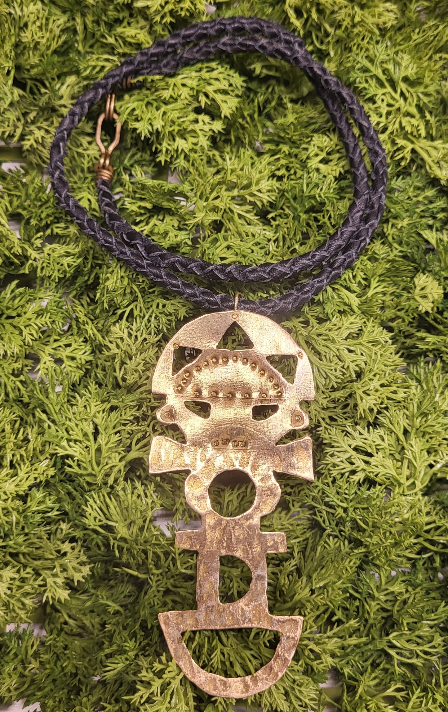 Tumi pendant necklace